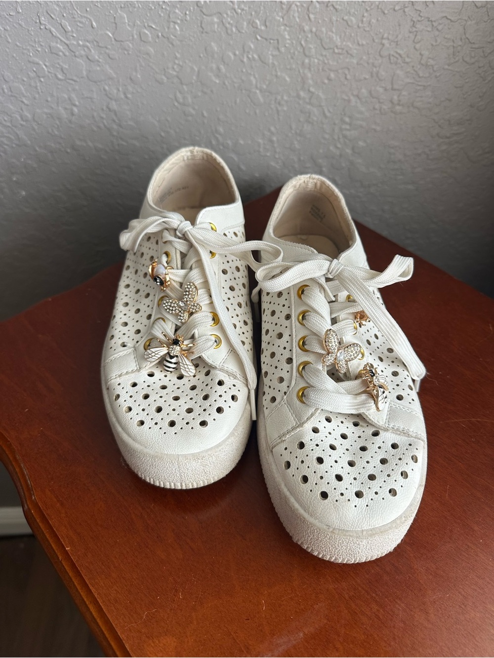 Dolce Vita White Perforated Lace-Up Sneakers with Gold Bee & Flower Charms